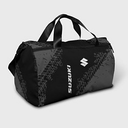 Спортивная сумка Suzuki Speed на темном фоне со следами шин
